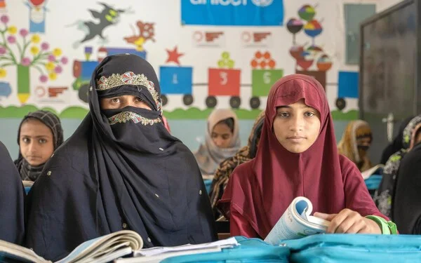 Like Mother, Like Daughter: Education Cannot Wait-supported UNICEF Accelerated Learning Programme enables a mother and daughter affected by floods and other crises to return to school in Pakistan.